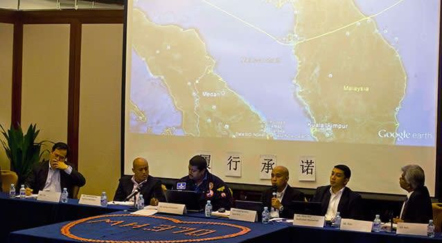 Members of the Malaysia team involved in the search of the Malaysia Airlines MH370 brief relatives of Chinese passengers onboard the missing plane at a hotel in Beijing, China. Photo: AP