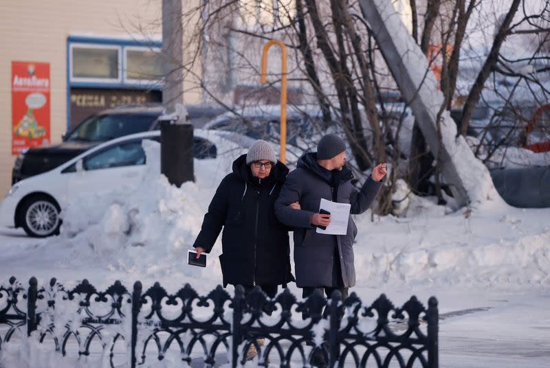 Mother of Alexei Navalny arrives at the regional department of Russia's Investigative Committee in Salekhard