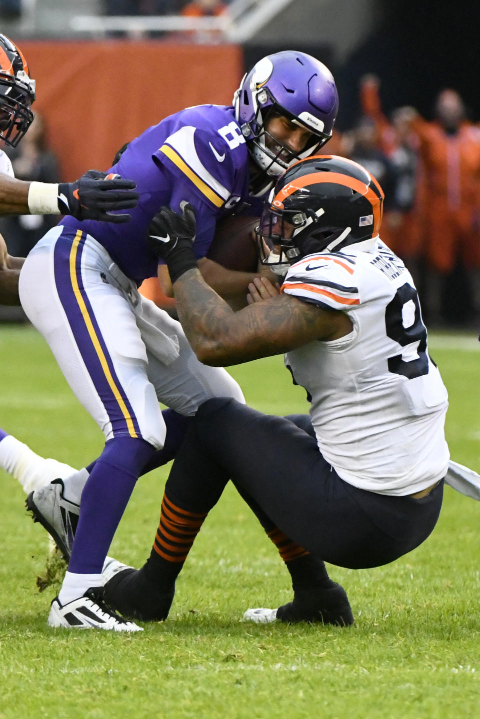 Minnesota Vikings quarterback Kirk Cousins (8) is sacked by Chicago Bears defensive end Roy Robertson-Harris during the second half of an NFL football game Sunday, Sept. 29, 2019, in Chicago. (AP Photo/Matt Marton)