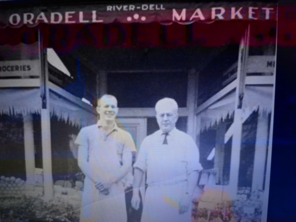 A young Charlie Kloeber and his father, Charlie Sr. working at the Oradell Market circa 1950s.