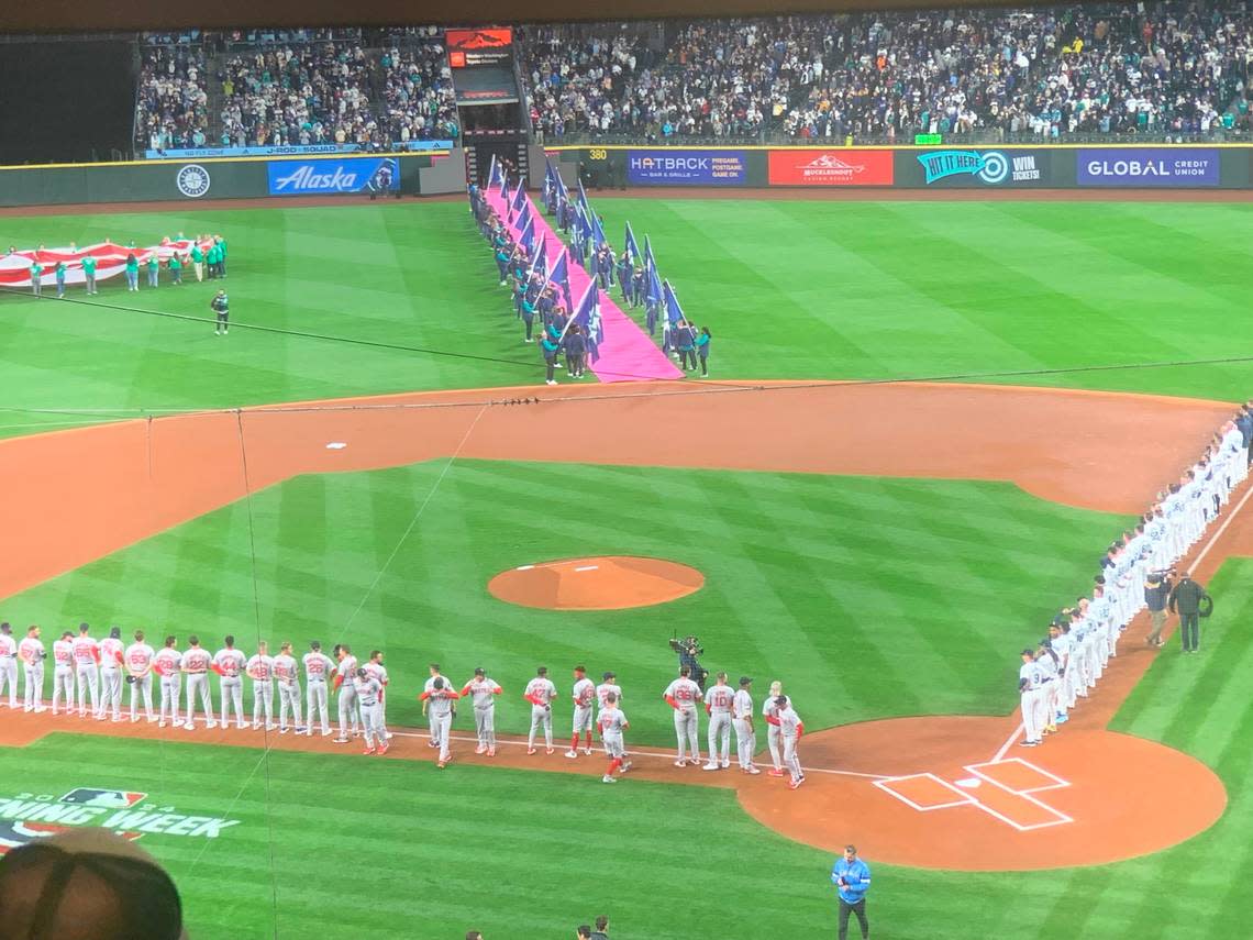 The view of the Mariners and Boston Red Sox after Ben Gibbard, from the Bellingham-formed band Death Cab for Cutie, sang the national anthem before the opening game of the Major League Baseball season in Seattle March 28, 2024. Gregg Bell/The News Tribune