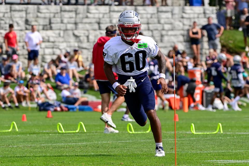 Patriots wide receiver Demario Douglas performs a running drill during training camp last week.