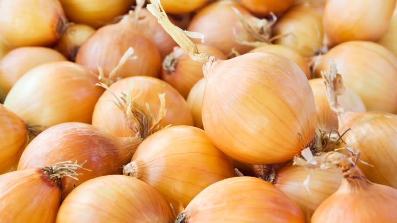 Yellow onions in pile