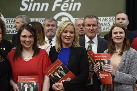 Sinn Fein leader Michelle O'Neill (C) stands with other candidates at the launch of the Sinn Fein campaign for the 2017 Assembly election, in Armagh, Northern Ireland, February 15, 2017. REUTERS/Clodagh Kilcoyne