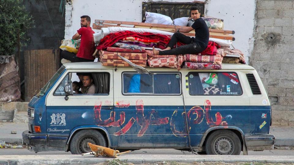 PHOTO: Displaced Palestinians travel in a vehicle as they flee Rafah, on May 12, 2024. (Hatem Khaled/Reuters)