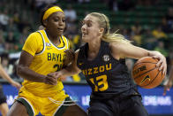 Missouri guard Haley Troup (13) draws contact from Baylor guard Ja'Mee Asberry (21) in the first half of an NCAA college basketball game in Waco, Texas, Saturday, Dec. 4, 2021. (AP Photo/Emil Lippe)