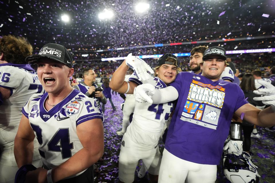 TCU players celebrate after the Fiesta Bowl NCAA college football semifinal playoff game against Michigan, Saturday, Dec. 31, 2022, in Glendale, Ariz. (AP Photo/Ross D. Franklin)