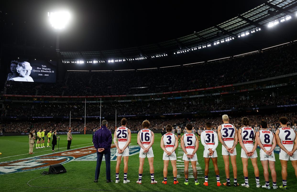 A minutes silence is observed in honour of Her Majesty Queen Elizabeth II during the 2022 AFL First Semi Final match between the Collingwood Magpies and the Fremantle Dockers at the Melbourne Cricket Ground on September 10, 2022.