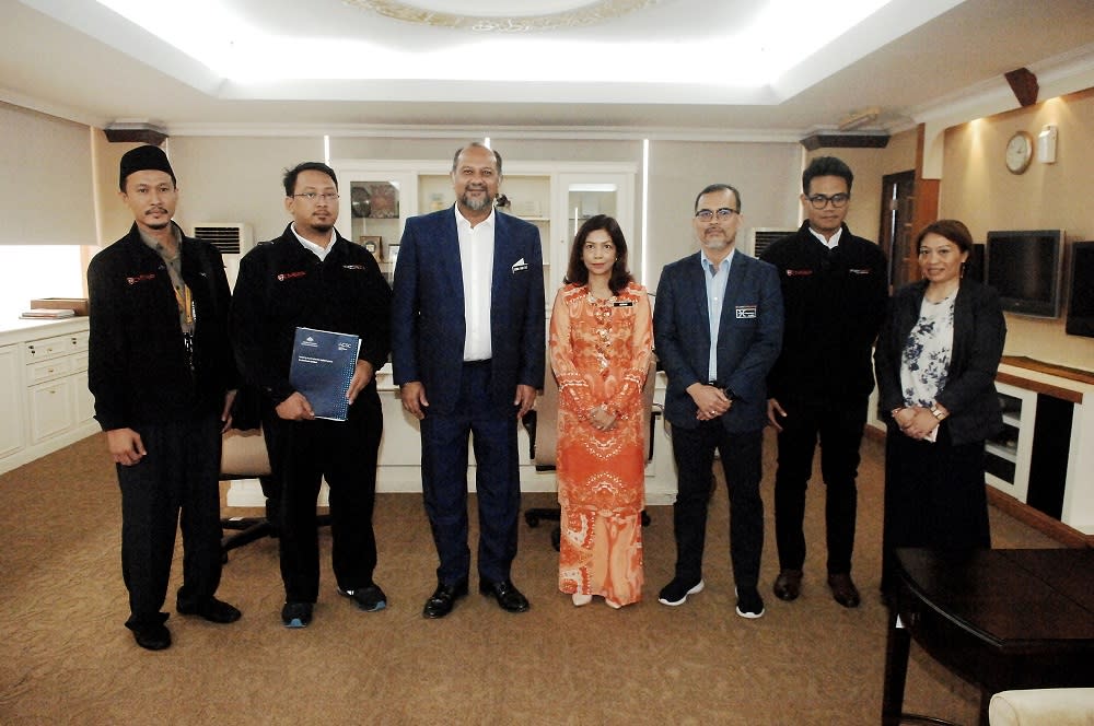 (From left) Mohd Hafiz Mat Tabrani, Fathi Kamil Mohad Zainuddin, Communications and Multimedia Minister Gobind Singh Deo, Datuk Suriani Ahmad, Aswami Fadillah Mohd Ariffin, Muhammad Hafizuddin Sharul Lazi and Zowita Zamri. — Picture courtesy of Communications and Multimedia Ministry