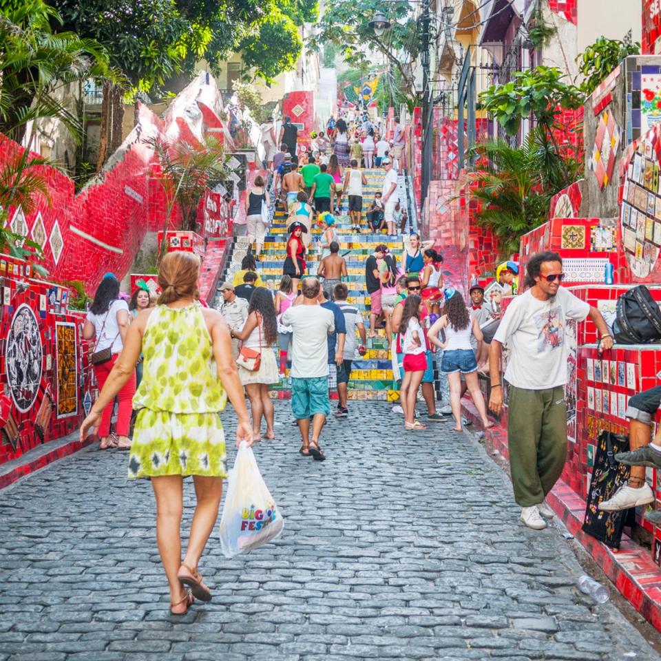 The Arcos de Lapa, an aqueduct that used to carry water to downtown Rio, is the symbol of the neighbourhood (Getty Images)