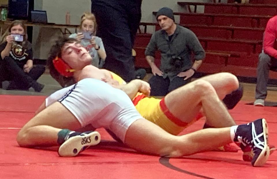 Girard's Story Buchanan tries to escape an arm hold by Penns Valley's Ty Watson during their 152-pound championship match at Saturday's Tool City Tournament in Meadville. Buchanan not only escaped, but won a 9-7 sudden-victory decision and was voted the tournament's outstanding wrestler.