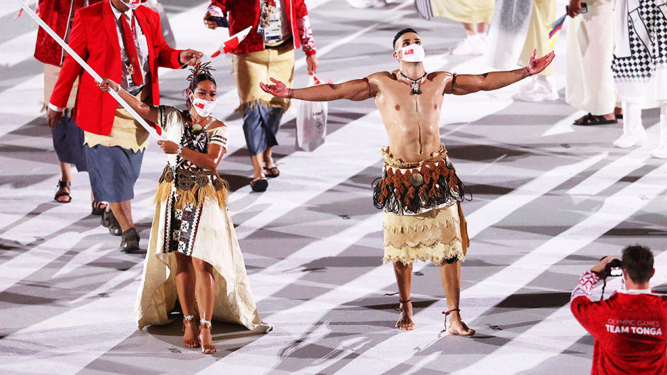 Tongan flag bearers Malia Paseka and Pita Taufatofua, pictured here at the opening ceremony.