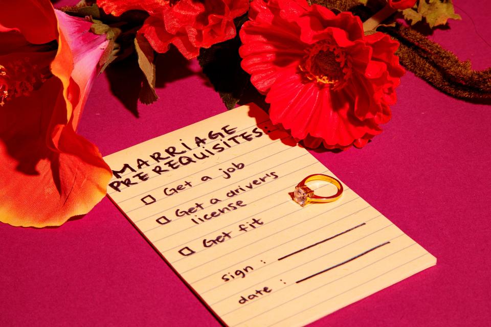 flowers surrounding a note with marriage perquisites listed