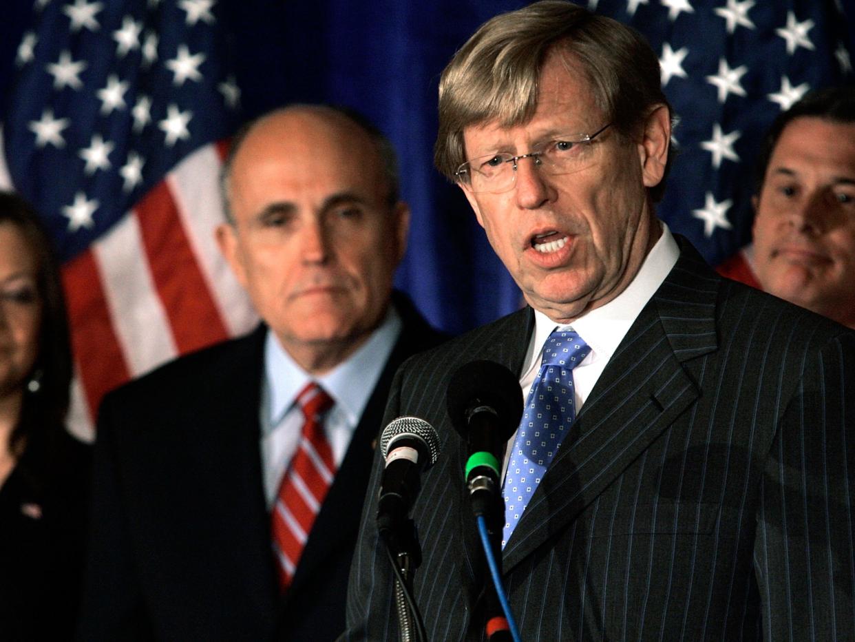 Ted Olson, pictured in 2007 while representing Rudy Giuliani during his presidential bid, has said the election is settled in Joe Biden’s favour (Getty Images)