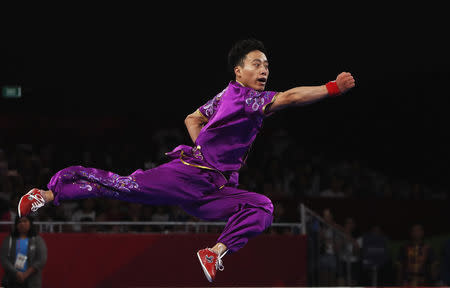 Wushu – 2018 Asian Games – Men's Changquan - Final – JIExpo Kemayoran Hall B3 - Jakarta, Indonesia - August 19, 2018 - Sun Peiyuan of China competes. REUTERS/Beawiharta