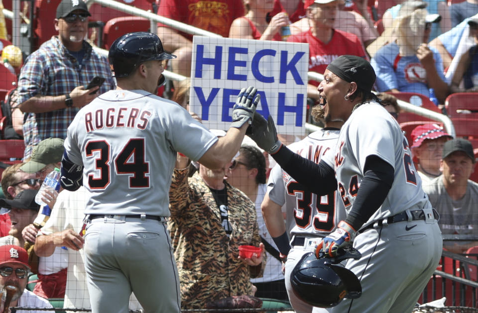 Detroit Tigers' Jake Rogers (34) is congratulated by teammate Miguel Cabrera after hitting a grand slam in the sixth inning of a baseball game against the St. Louis Cardinals, Sunday, May 7, 2023, in St. Louis. (AP Photo/Tom Gannam)
