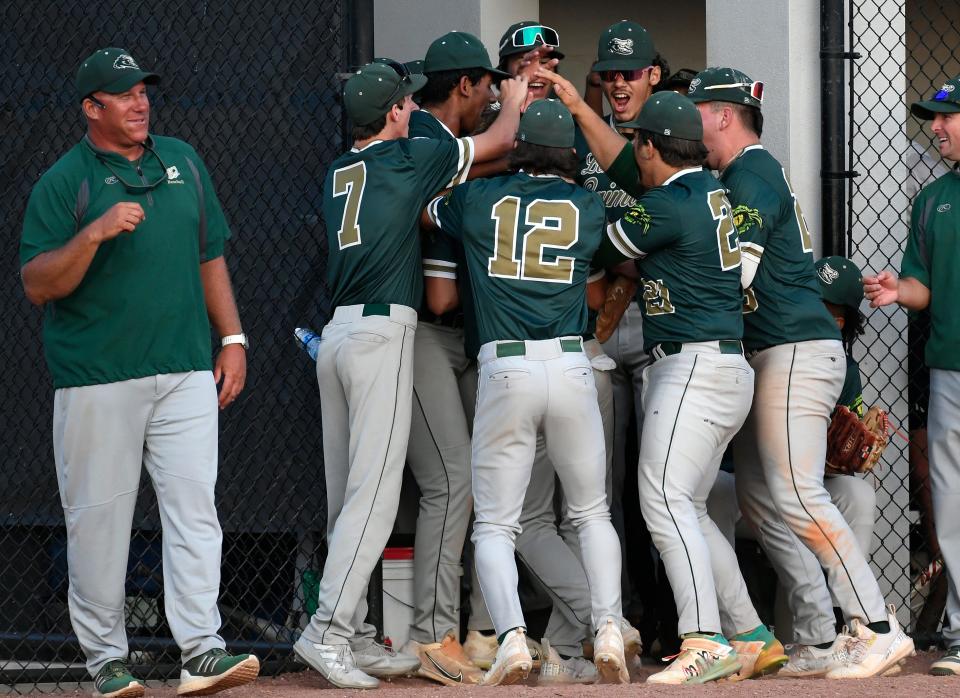 The Island Coast High Gators captured a 3-2 victory over Parrish Community High Bulls in the Class 5A-Region 3 quarterfinals Tuesday night at the Bulls field in Parrish.