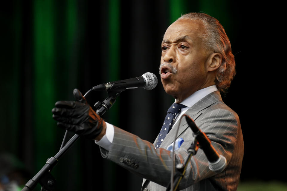 The Rev. Al Sharpton addresses the crowd at a Juneteenth rally in Tulsa, Okla., Friday, June 19, 2020. Juneteenth marks the day in 1865 when federal troops arrived in Galveston, Texas, to take control of the state and ensure all enslaved people be freed, more than two years after the Emancipation Proclamation. (AP Photo/Charlie Riedel)