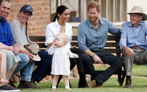 Prince Harry, Duke of Sussex and Meghan, Duchess of Sussex visit a local farming family, the Woodleys, including their little girl Ruby - Credit: Getty