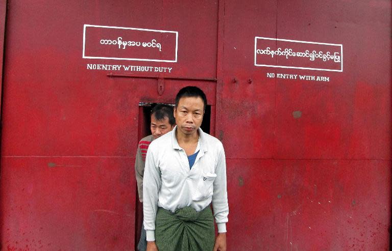 A political prisoner walks out of a prison after his release in Kalay, in Myanmar's northern Sagaing division on October 8, 2013