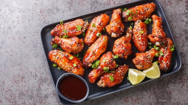 glazed chicken on baking sheet