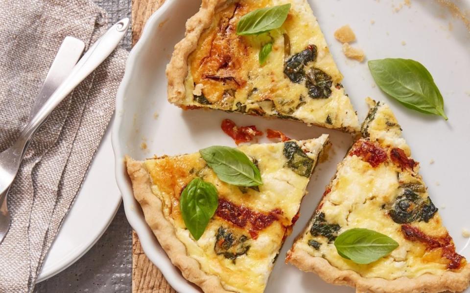 Parade<p>Mayonnaise—in the filling and the crust, is the secret ingredient that lends delicious tang to this delicious quiche made with sun-dried tomatoes, goat cheese and spinach.</p><p><strong>Get the recipe: <a href="https://parade.com/1021177/parade/sun-dried-tomato-goat-cheese-and-spinach-quiche-recipe/" rel="sponsored" target="_blank" data-ylk="slk:Sun-Dried Tomato, Goat Cheese and Spinach Quiche;elm:context_link;itc:0;sec:content-canvas" class="link "><em>Sun-Dried Tomato, Goat Cheese and Spinach Quiche</em></a></strong></p>
