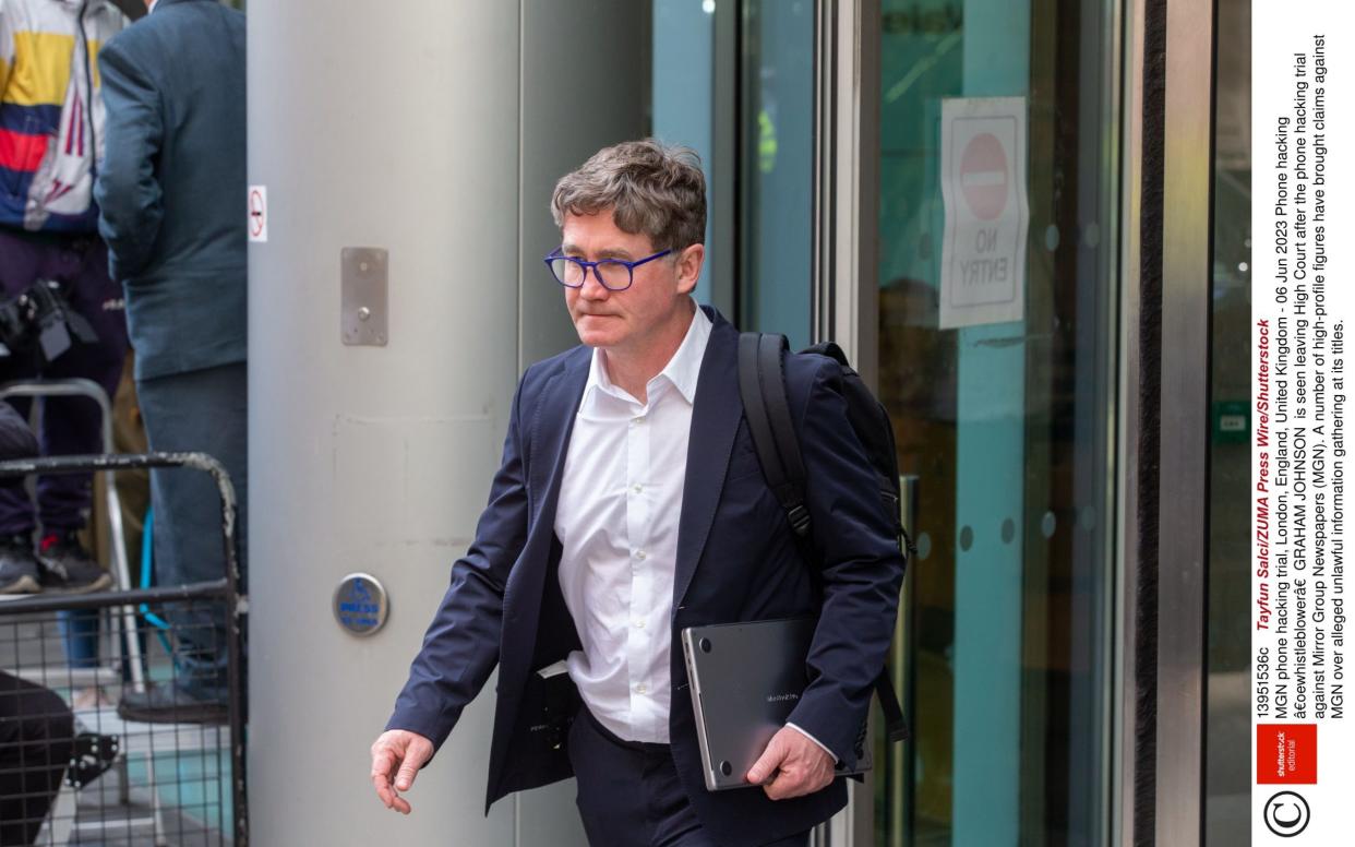 Graham Johnson leaving the High Court in London