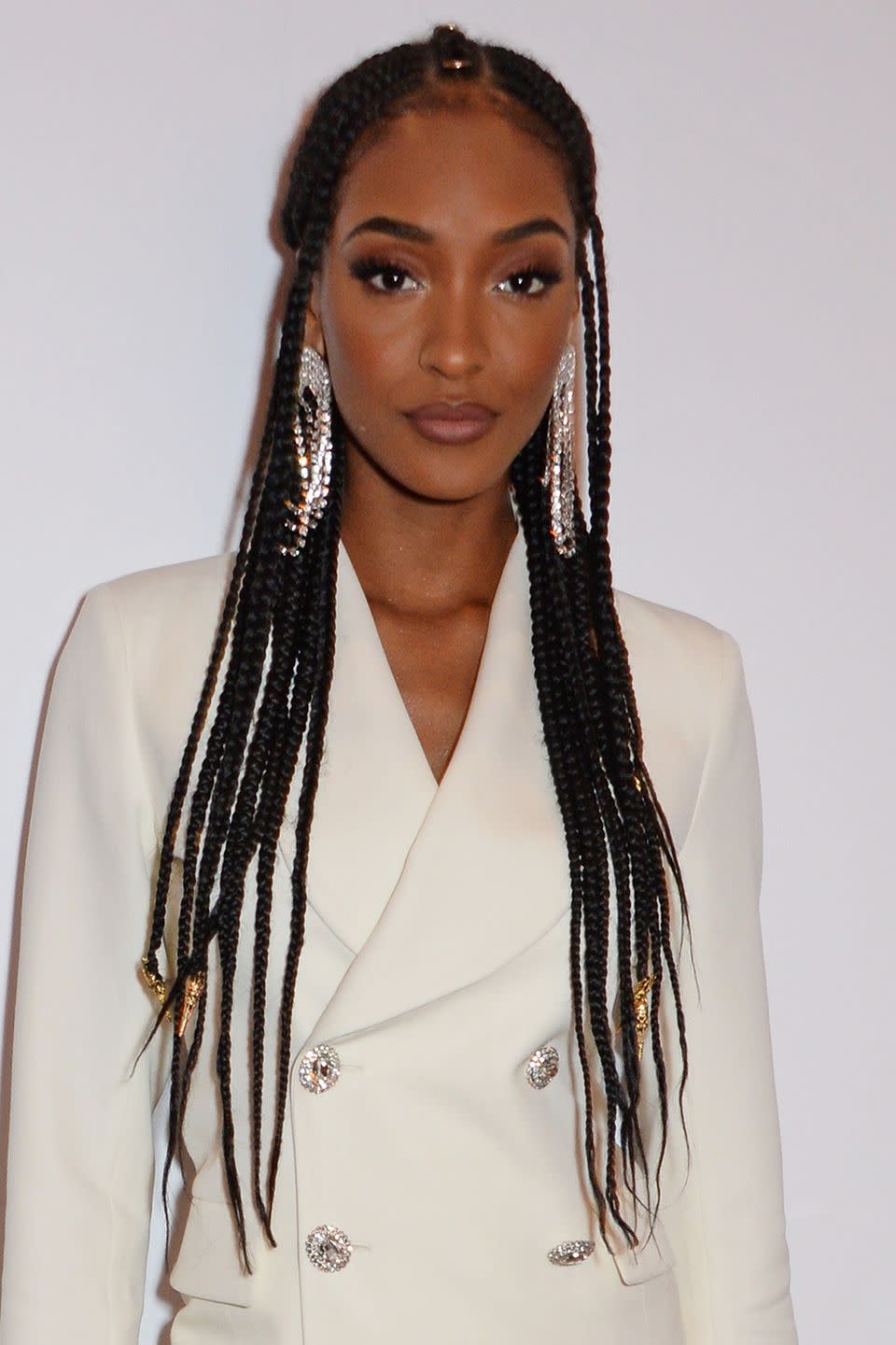 <p>Add a little something extra to your half-up look with some beading like Jourdan Dunn. Her stunning braids are styled in a half- up, half-down look and finished with gold and silver accents.</p>