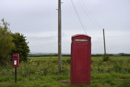 A telephone and postbox are seen in rural Antrim, Northern Ireland June 28, 2016. REUTERS/Clodagh Kilcoyne