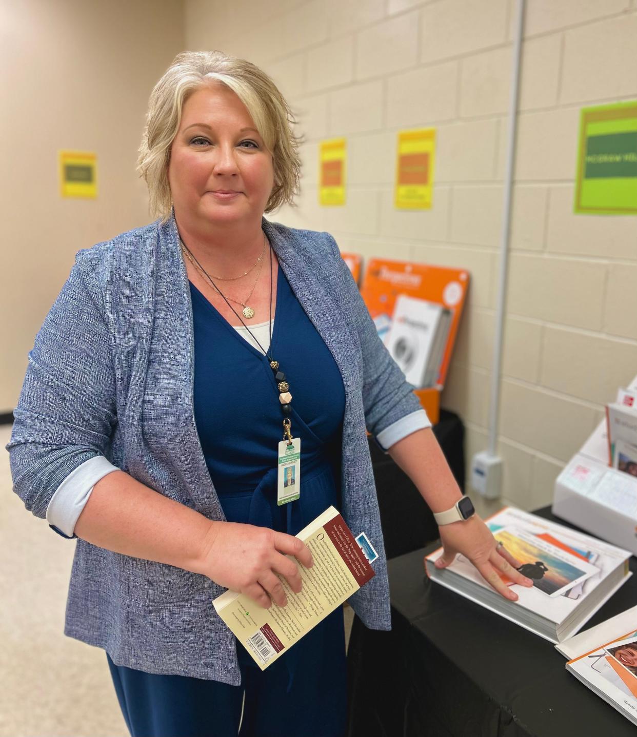 SCCPSS Director of Curriculum Programming, Andrea Burkiett shares a sneak peak of Study Sync's English language arts (ELA) curriculum option on display at Leiston Shuman Elementary School ahead of the district's public curriculum review to be held on Thursday Nov. 16.
