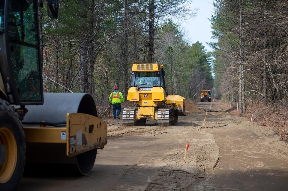 Eversource's transmission line construction project is underway in Memorial Forest off Dutton Road in Sudbury, March 22, 2023. An underground power line will extend for 7.6 miles underneath the former MBTA railroad corridor through Sudbury, Marlborough, Stow and Hudson; the line's remaining 1.4 miles will be placed under Hudson streets. The former Boston to Northampton Line runs east to west, and will eventually be paved over by the state Dept. of Conservation and Recreation. It will intersect with the Bruce Freeman Rail Trail near Union Avenue in Sudbury.