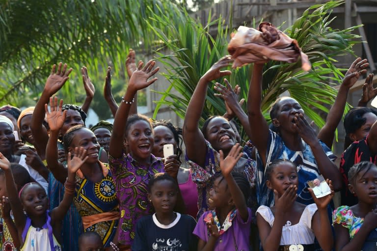 Thousands lined the streets of Bangui, capital of the strife-ridden Central African Republic, to welcome Pope Francis as he arrived November 29, 2015 as 'a pilgrim of peace' bringing a message of hope and reconciliation