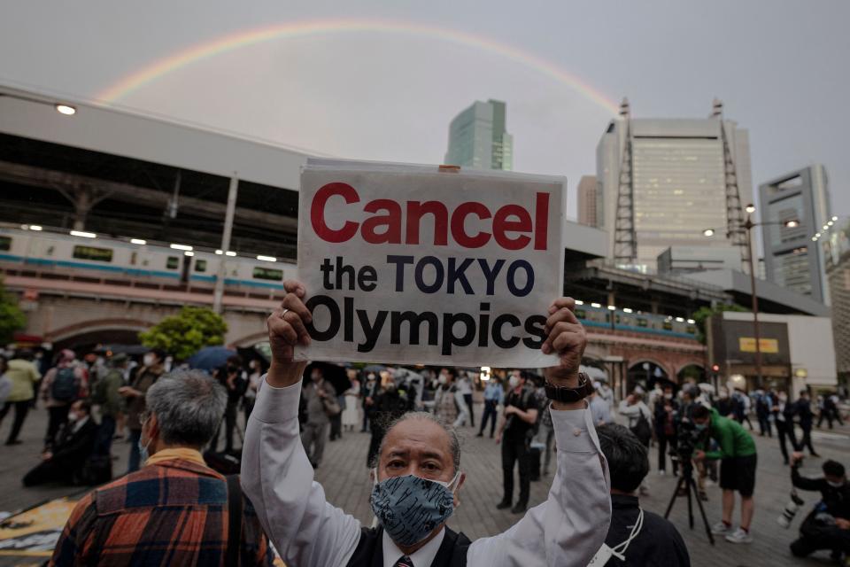 People take part in a protest against the hosting of the  Olympic Games in Tokyo.