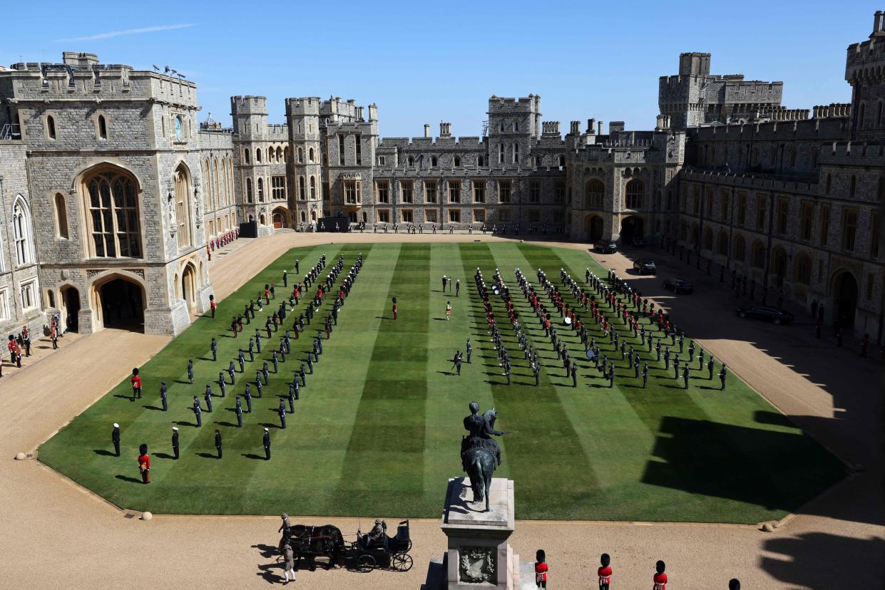 A general view shows armed forces taking their positions in the quadrangle ahead of the ceremonial funeral procession of Britain's Prince Philip, Duke of Edinburgh to St George's Chapel in Windsor Castle in Windsor, west of London, on April 17, 2021.
