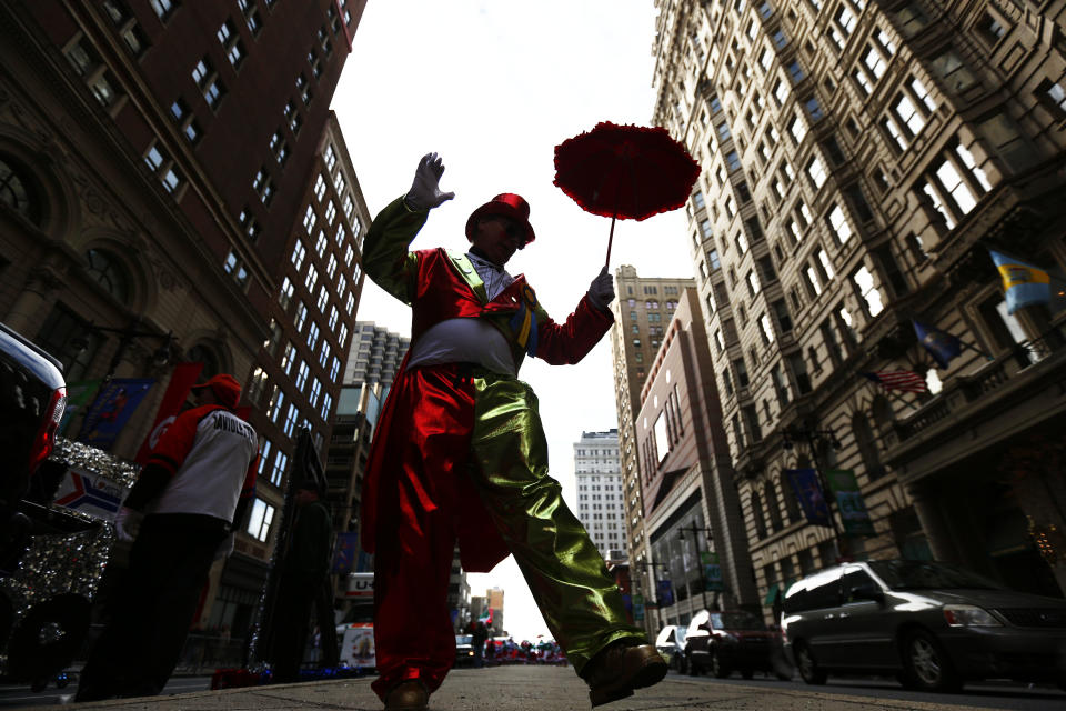 A mummer struts during the annual New Year's Day parade, Wednesday, Jan. 1, 2014, in Philadelphia. (AP Photo/Matt Rourke)