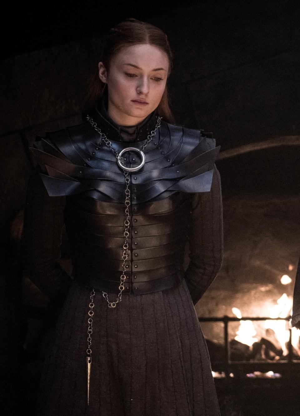 Sansa wearing her necklace with a Needle-inspired ornament, on season eight.