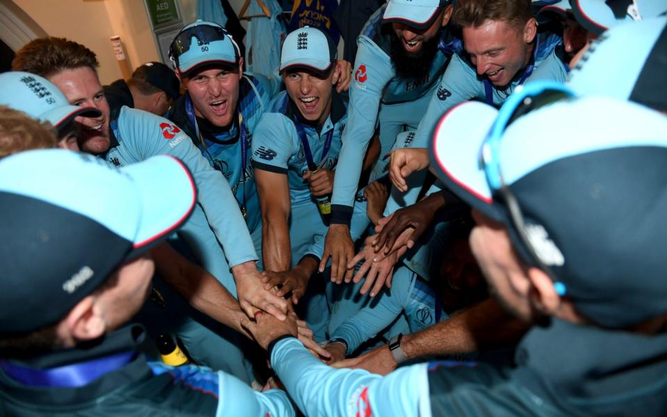 England celebrate in the dressing rooms after winning the Final of the ICC Cricket World Cup 2019 between England and New Zealand at Lord's Cricket Ground on July 14, 2019 in London, England - GETTY IMAGES