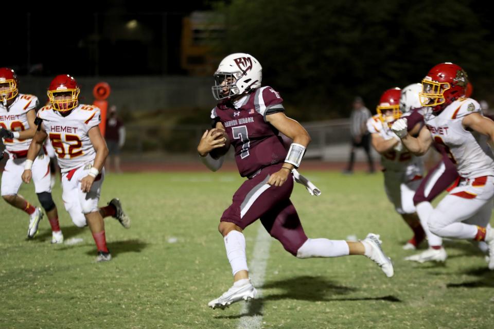 Rancho Mirage quarterback Ethan Zamora runs for a touchdown against Hemet in Rancho Mirage, Calif., on Thursday, August 18, 2022. 