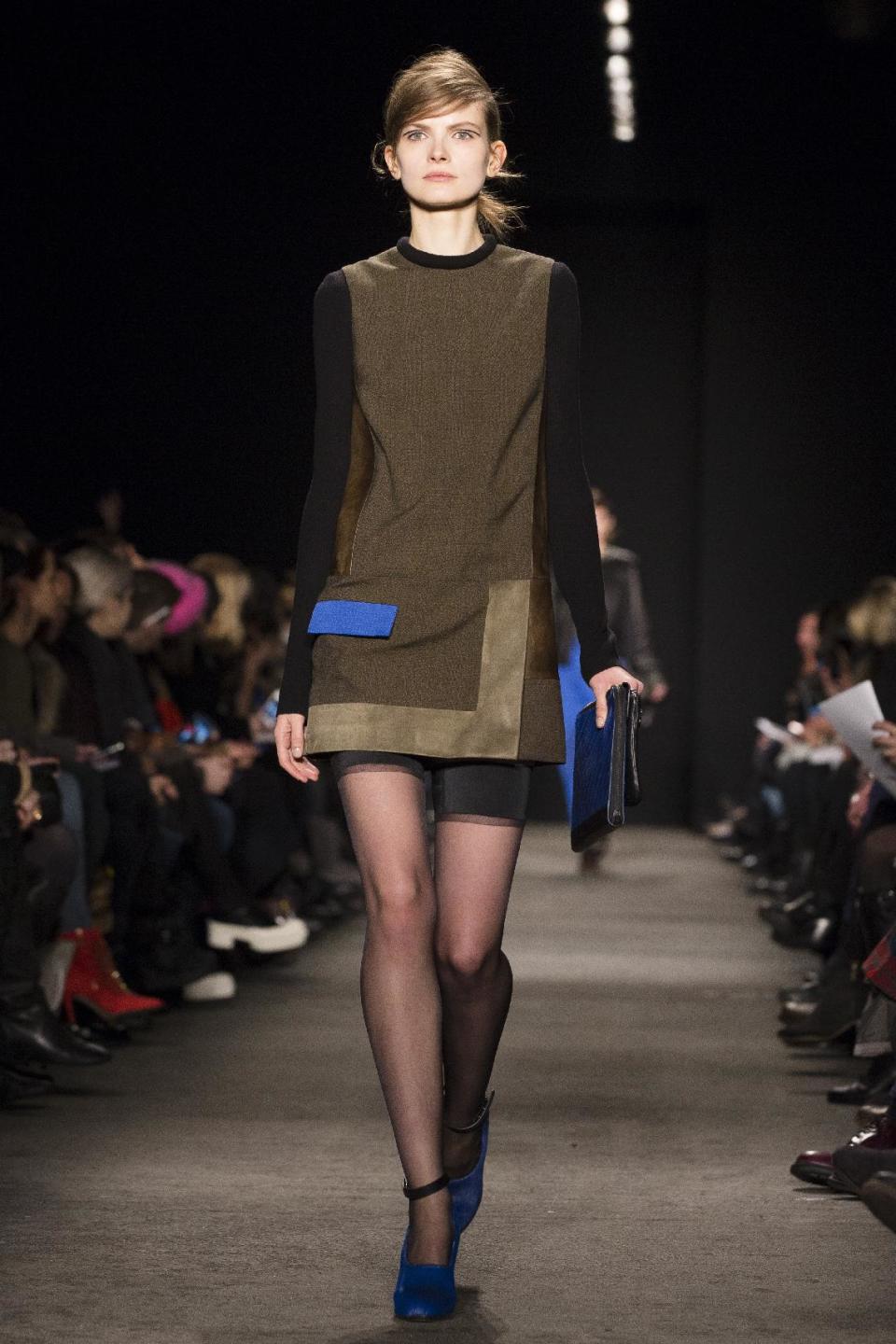 A model walks the runway at the presentation of the Rag & Bone Fall 2013 fashion collection during Fashion Week, Friday, Feb. 8, 2013, in New York. (AP Photo/John Minchillo)