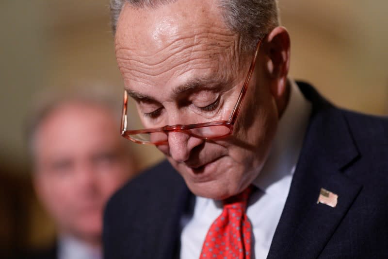 Senate Minority Leader Schumer speaks to Capitol Hill reporters following the weekly Senate Democratic policy lunch at the U.S. Capitol in Washington