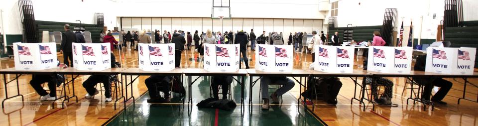 U.S. Citizens Head To The Polls To Vote In Presidential Election