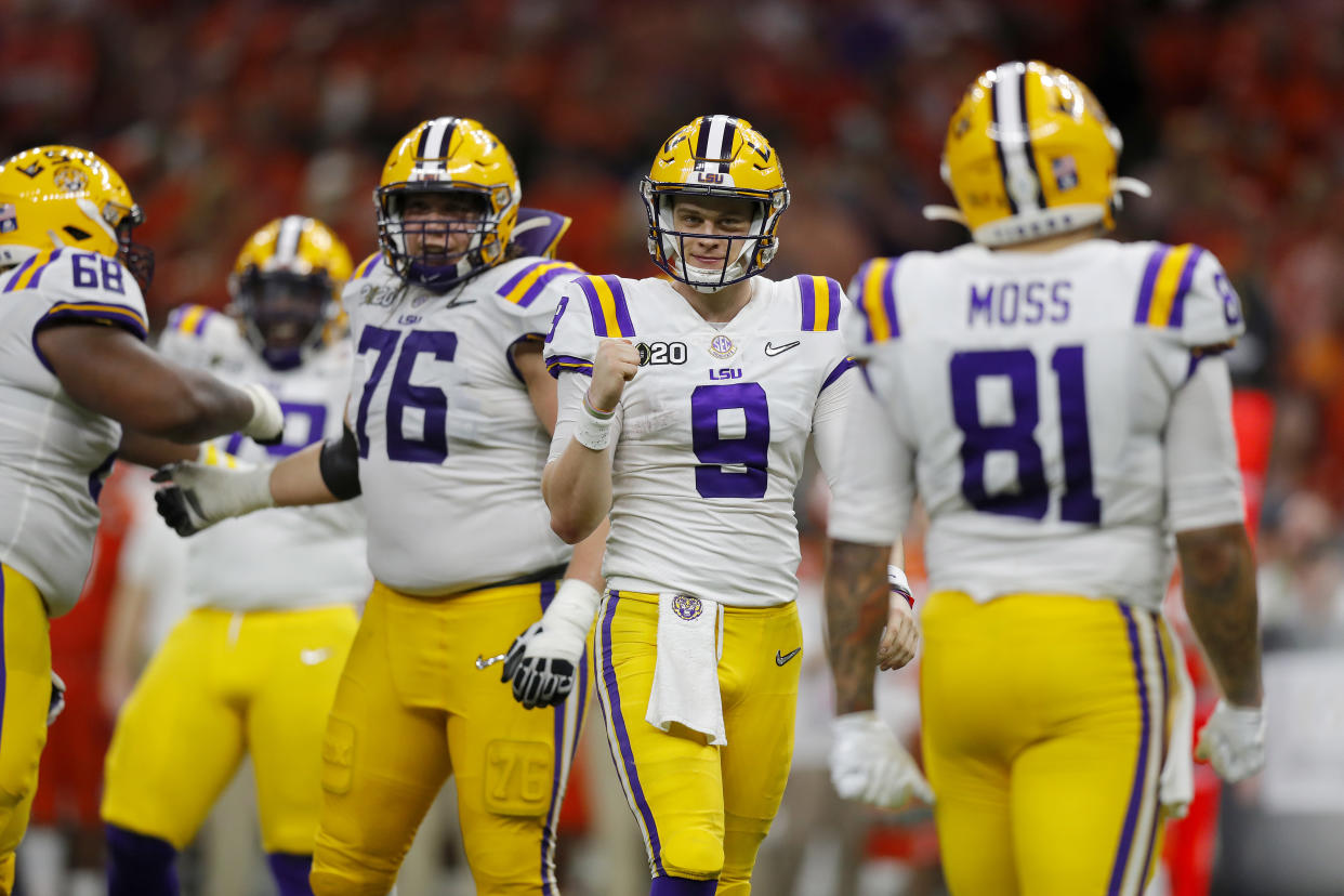 NEW ORLEANS, LOUISIANA - JANUARY 13: Joe Burrow #9 of the LSU Tigers reacts to a touchdown against Clemson Tigers during the third quarter in the College Football Playoff National Championship game at Mercedes Benz Superdome on January 13, 2020 in New Orleans, Louisiana. (Photo by Jonathan Bachman/Getty Images)