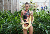 Snakes alive! Models at the 2014 We Are Handsome show sent the audience ducking for cover after they bought out a huge yellow python.