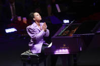 Alicia Keys reacts after performing during a celebration of life for Kobe Bryant and his daughter Gianna Monday, Feb. 24, 2020, in Los Angeles. (AP Photo/Marcio Jose Sanchez)
