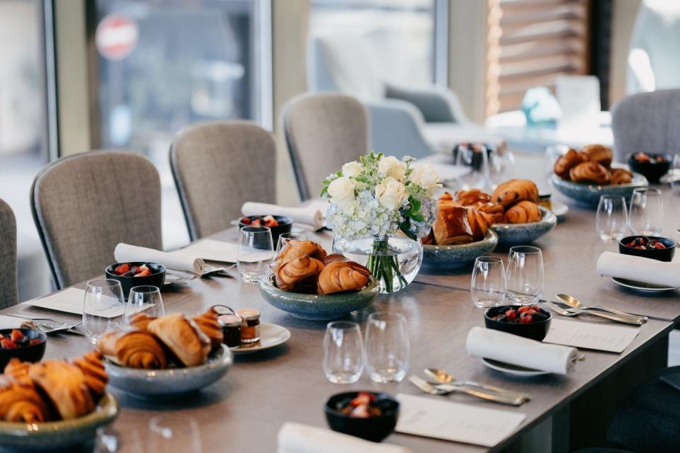 a table with food and glasses on it