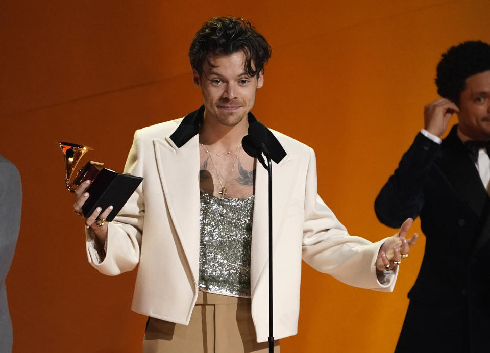 Harry Styles accepts the award for album of the year for "Harry's House" at the 65th annual Grammy Awards on Sunday, Feb. 5, 2023, in Los Angeles. (AP Photo/Chris Pizzello)