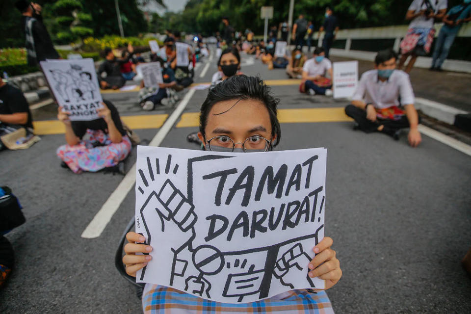 About a hundred Malaysian youths gathered in front of the Parliament of Malaysia building, calling for Parliament to immediately reconvene and end the state of Emergency, April 30, 2021. ― Picture by Hari Anggara