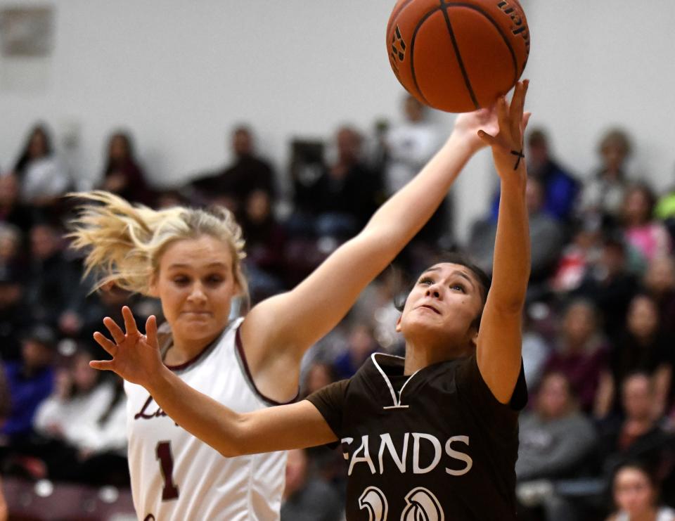 Sands' Elysa Martinez goes for a layup against Klondike in a District 8-1A basketball game Thursday, Feb. 2, 2023, at Cougar Gymnasium in Klondike.