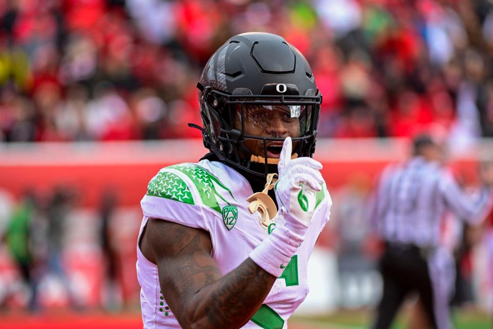 Oregon wide receiver Traeshon Holden reacts after a touchdown against Utah Saturday in Salt Lake City.