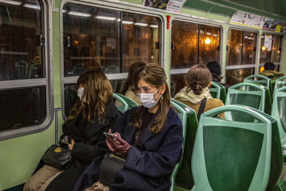 Two women pictured wearing masks in Venice as the coronavirus outbreak continues.